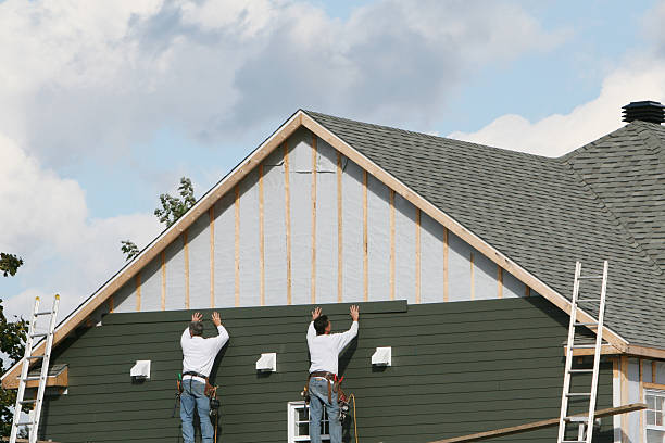 Professional Siding Contractor technician working in Benson, MN